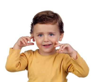 Shy small child two years old isolated on a white background