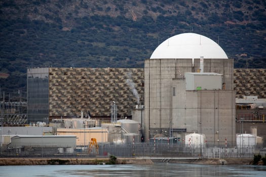 Almaraz, nuclear power plant in the center of Spain, surrounded by a green field