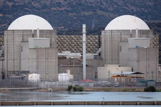 Almaraz, nuclear power plant in the center of Spain, surrounded by a green field