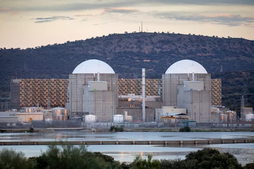 Almaraz, nuclear power plant in the center of Spain, surrounded by a green field