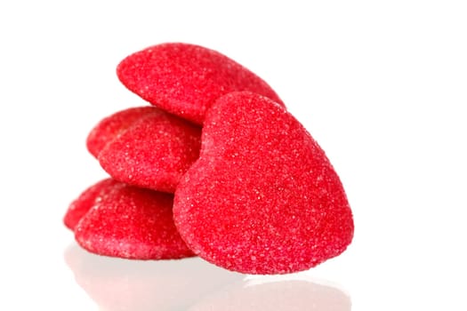 Red jelly hearts isolated on a white background