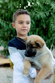 Latin child with his dog in a park