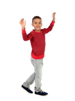 Happy latin child dancing isolated on a white background