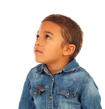 Funny small child with dark hair and black eyes crossing his arms isolated on a white background