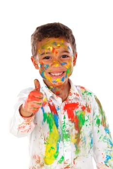 Funny boy with hands and face full of paint saying Ok isolated on a white background