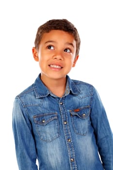 Funny small child with dark hair and black eyes crossing his arms isolated on a white background