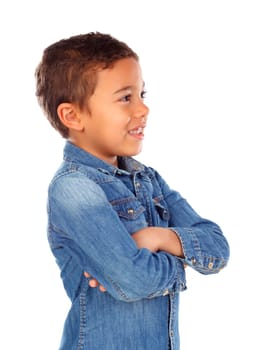 Funny small child with dark hair and black eyes crossing his arms isolated on a white background