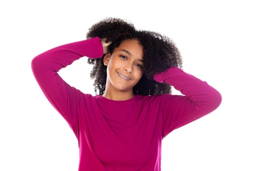 Beautiful teenager girl with pink sweater isolated on a white background