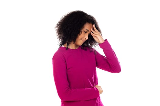 Beautiful teenager girl with pink sweater isolated on a white background