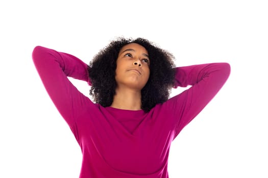 Teenager girl with afro hair wearing pink sweater isolated on a white background