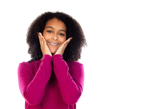 Beautiful teenager girl with pink sweater isolated on a white background