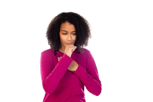 Teenager girl with afro hair wearing pink sweater isolated on a white background
