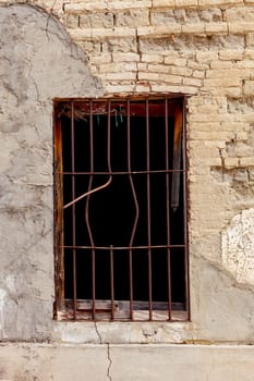 Ruined window of an abandoned house