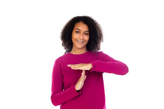Beautiful teenager girl with pink sweater isolated on a white background