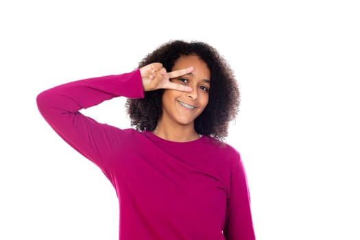 Beautiful teenager girl with pink sweater isolated on a white background