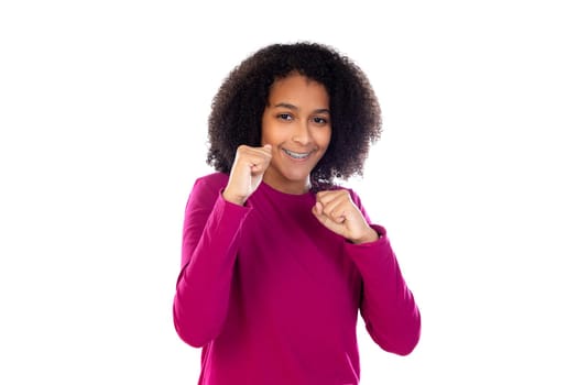Beautiful teenager girl with pink sweater isolated on a white background