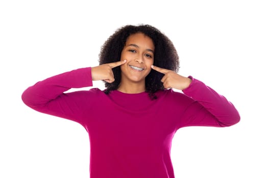 Beautiful teenager girl with dental braces isolated on a white background