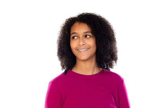Teenager girl with afro hair wearing pink sweater isolated on a white background