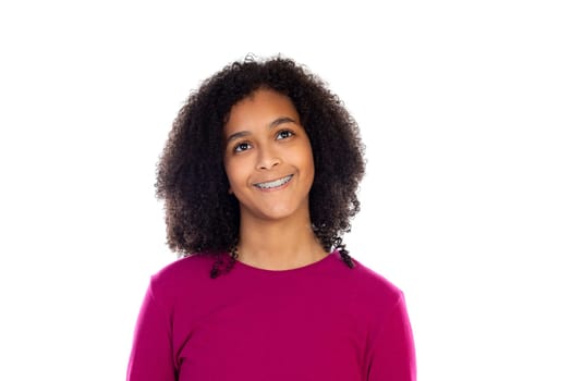 Teenager girl with afro hair wearing pink sweater isolated on a white background