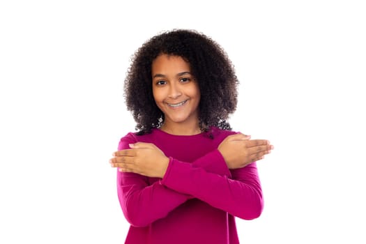Beautiful teenager girl with pink sweater isolated on a white background