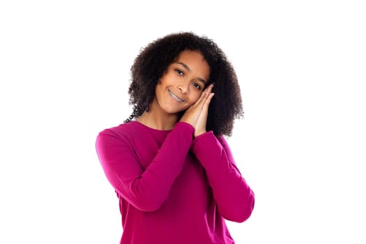Beautiful teenager girl with pink sweater isolated on a white background