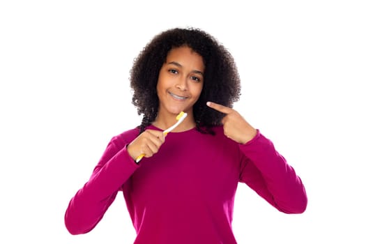 Teenager girl with afro hair wearing pink sweater isolated on a white background