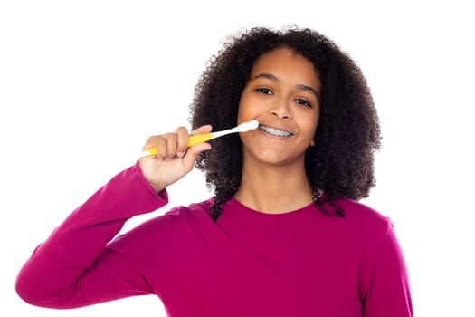 Teenager girl with afro hair wearing pink sweater isolated on a white background