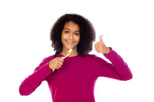 Teenager girl with afro hair wearing pink sweater isolated on a white background