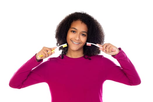 Teenager girl with afro hair wearing pink sweater isolated on a white background