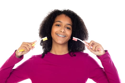 Teenager girl with afro hair wearing pink sweater isolated on a white background