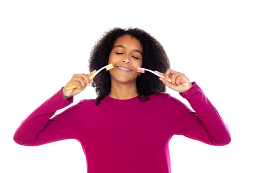 Teenager girl with afro hair wearing pink sweater isolated on a white background