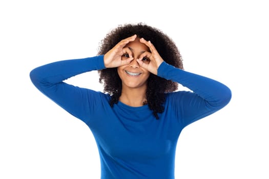 Teenager girl with afro hair wearing blue sweater isolated on a white background
