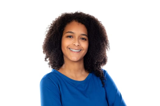 Teenager girl with afro hair wearing blue sweater isolated on a white background