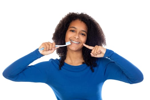 Teenager girl with afro hair wearing blue sweater isolated on a white background