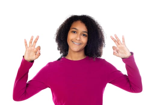 Beautiful teenager girl with pink sweater isolated on a white background