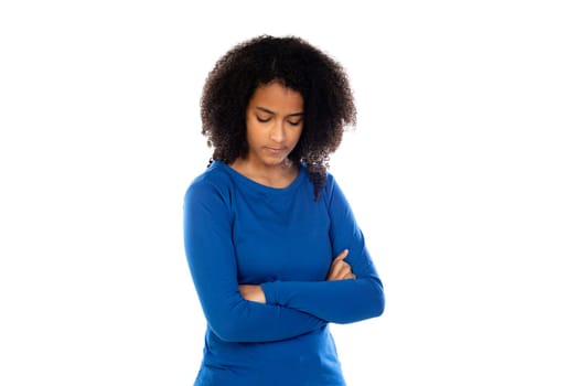 Teenager girl with afro hair wearing blue sweater isolated on a white background