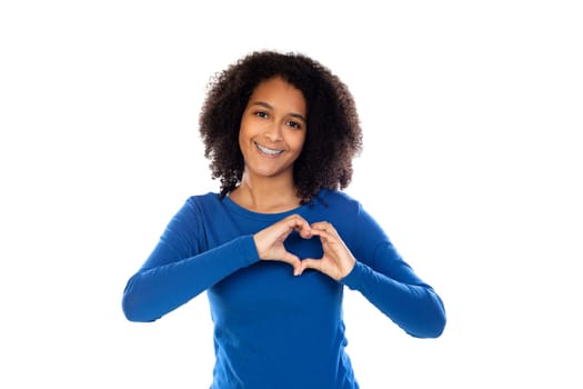 Teenager girl wearing blue sweater isolated on a white background