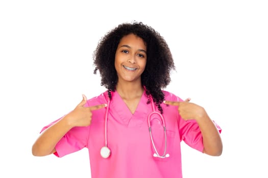 Adorable little doctor with pink uniform isolated on a white background