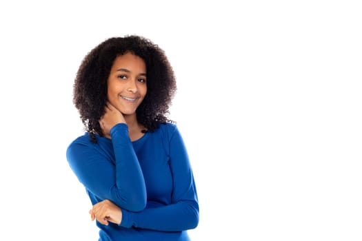 Teenager girl with afro hair wearing blue sweater isolated on a white background