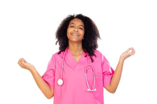 Adorable little doctor with pink uniform isolated on a white background