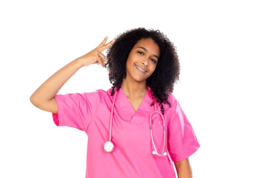 Adorable little doctor with pink uniform isolated on a white background