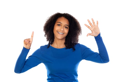 Teenager girl with afro hair wearing blue sweater isolated on a white background