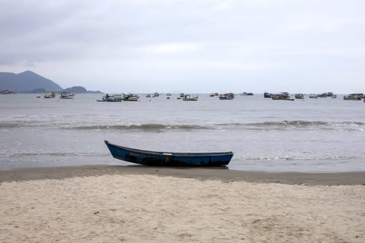 fishing boat ocean waves beach Brazil