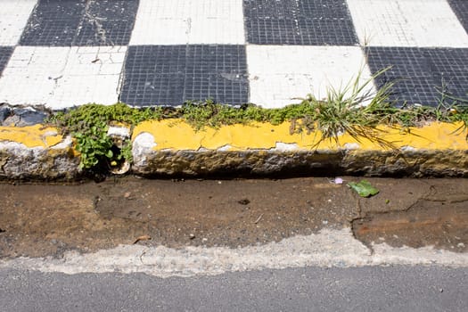 old sidewalk erosion water flowing