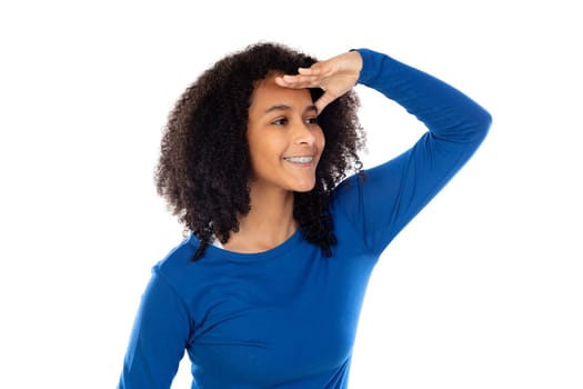 Teenager girl with afro hair wearing blue sweater isolated on a white background