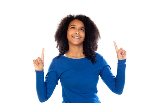 Teenager girl with afro hair wearing blue sweater isolated on a white background