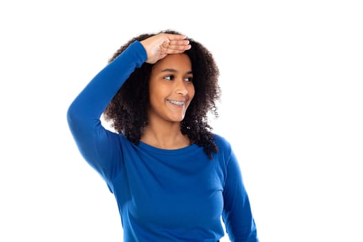Teenager girl wearing blue sweater isolated on a white background