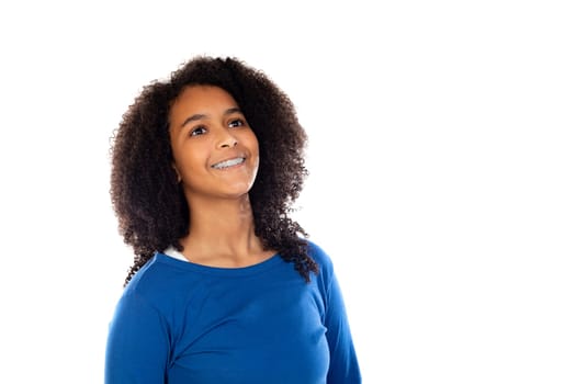 Teenager girl with afro hair wearing blue sweater isolated on a white background