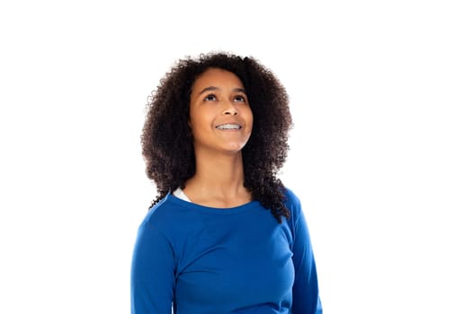 Teenager girl with afro hair wearing blue sweater isolated on a white background