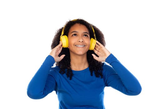 Teenager girl wearing blue sweater isolated on a white background